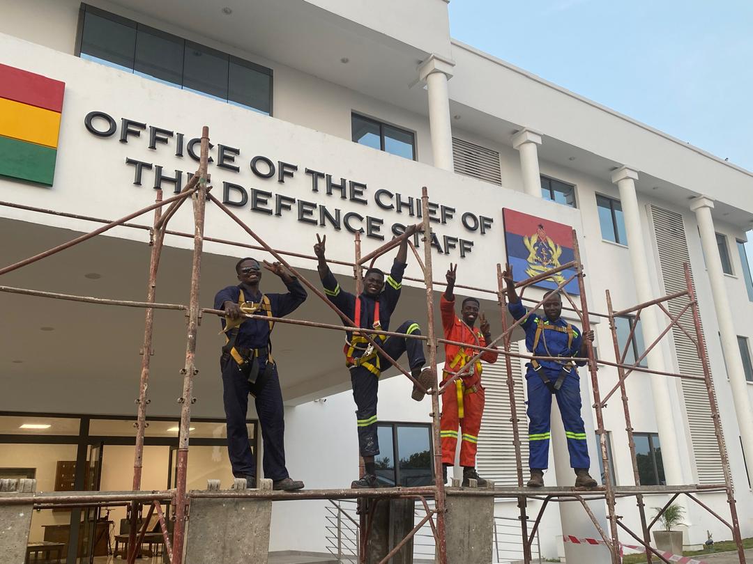 White Beam team installing building signage at the Office of the Chief of the Defence Staff