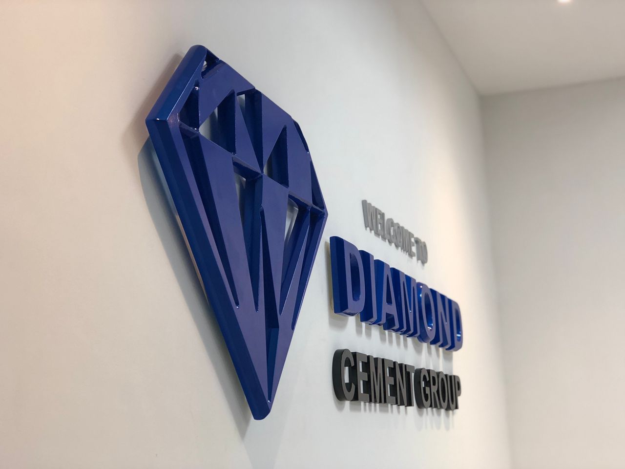 Diamond Cement: Building & Welcome Signage for Diamond Cement Ghana: signage project by White Beam Concepts, Ghana — 3D Logo, Welcome Wall